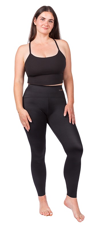 Woman standing in Lipoelastic ACTIVE compression leggings, head to toe