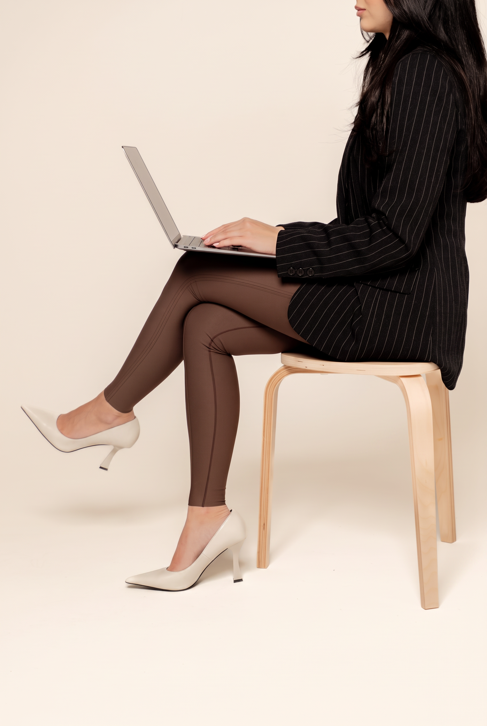 Woman at work in sheer compression